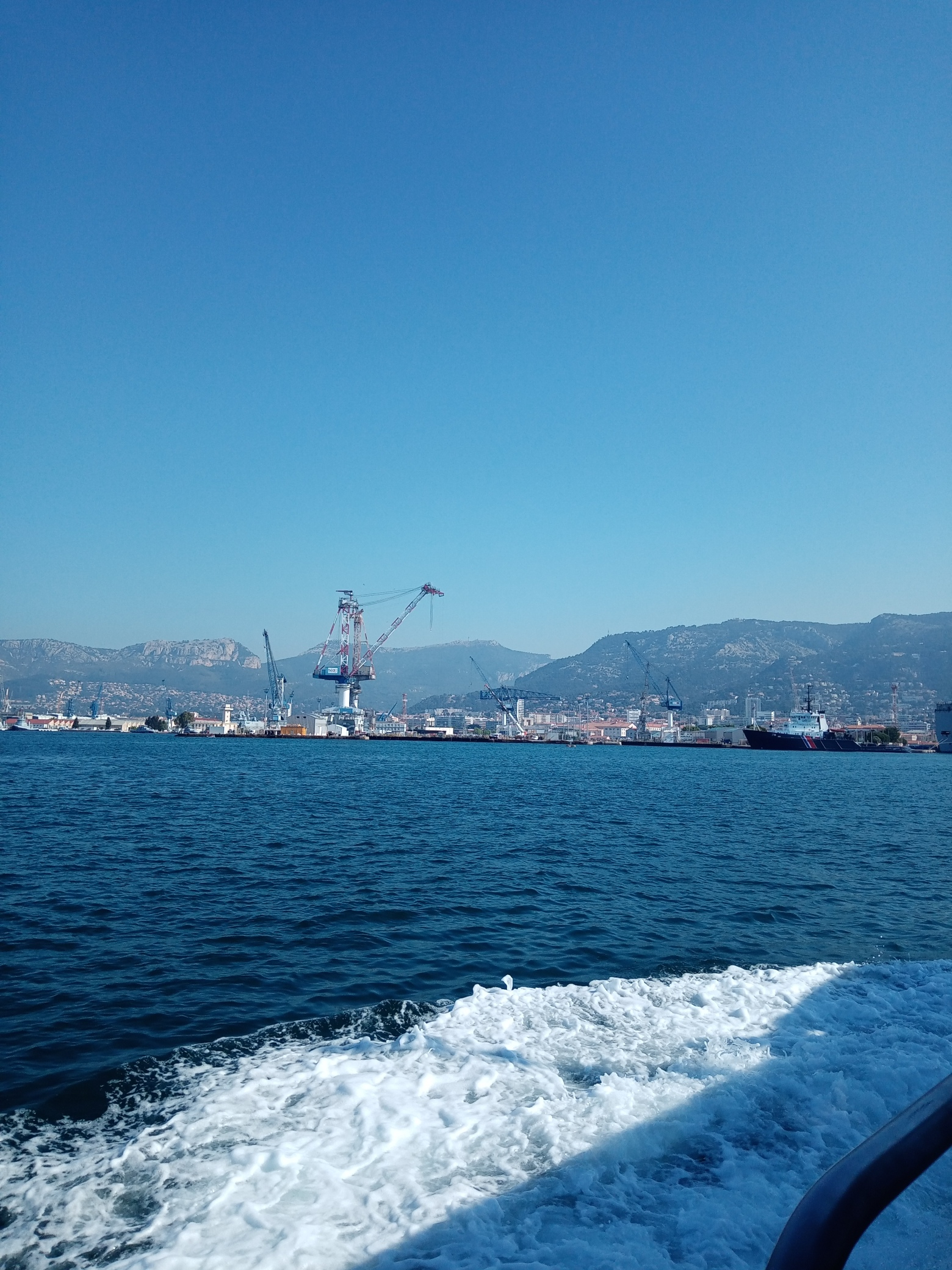Bay of Toulon, military town, various boats and aircraft carrier