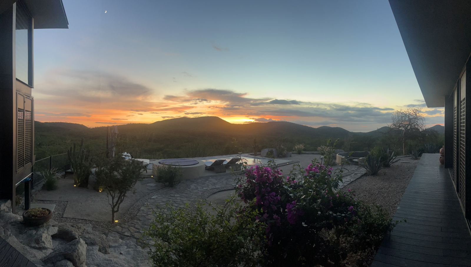 August sun dissolving on the horizon