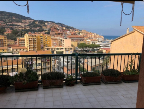 Sunny terraced condo perched over a southern Tuscany fishing village, with beautiful views of valley and sea.