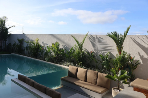 Verborgen tropisch appartement op Bali met modern comfort (5 minuten van het strand)